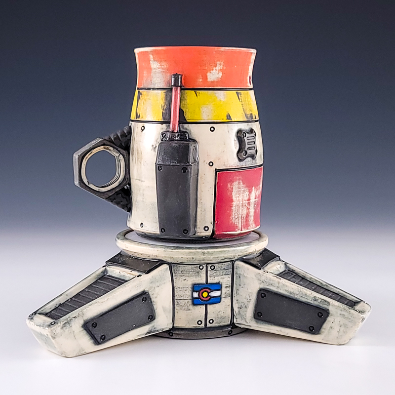 “Launchpad Mug” by John Hamilton