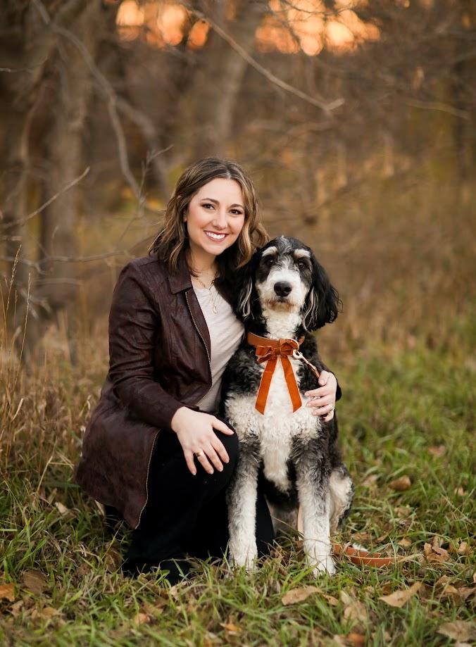 Jacquelyn “Jakki” Maser, Director of Counseling Services at Barton Community College, poses with Luna, the campus therapy dog. Maser was recently named Counselor of the Year by the Kansas Counseling Association for her leadership in providing compassionate mental health services to students.