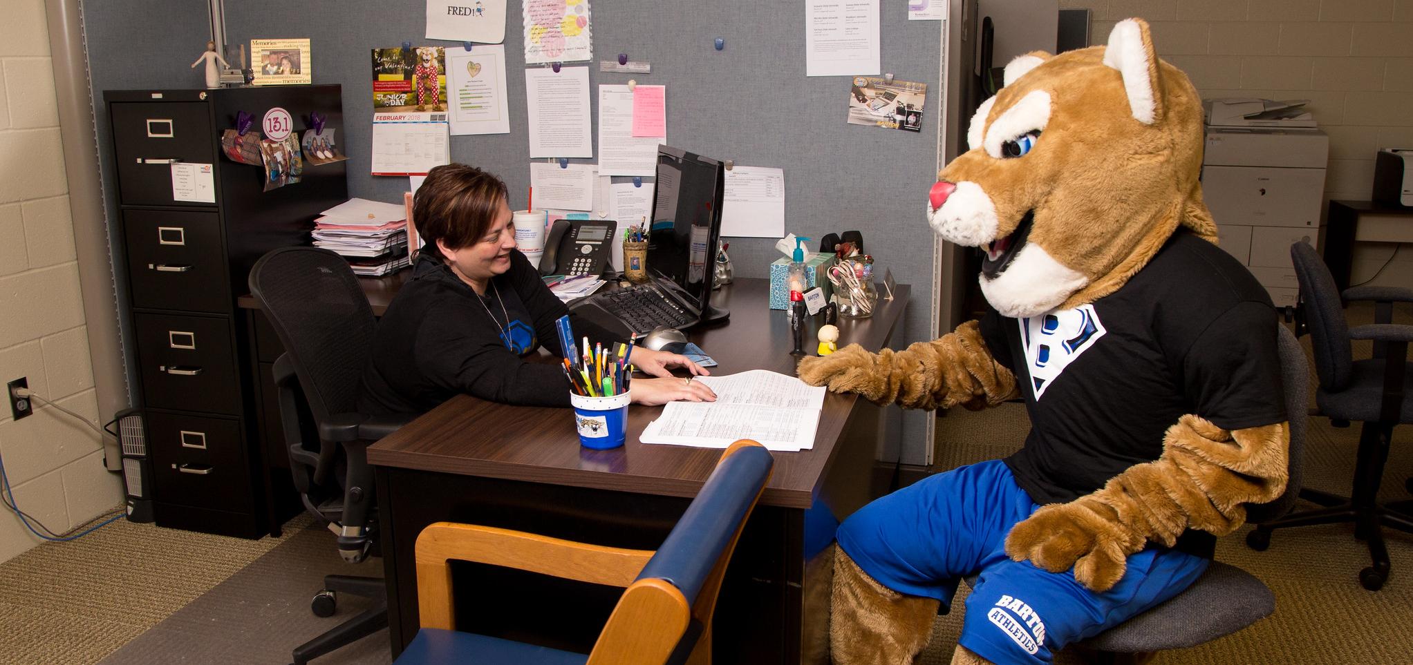 Bart sits with an advisor