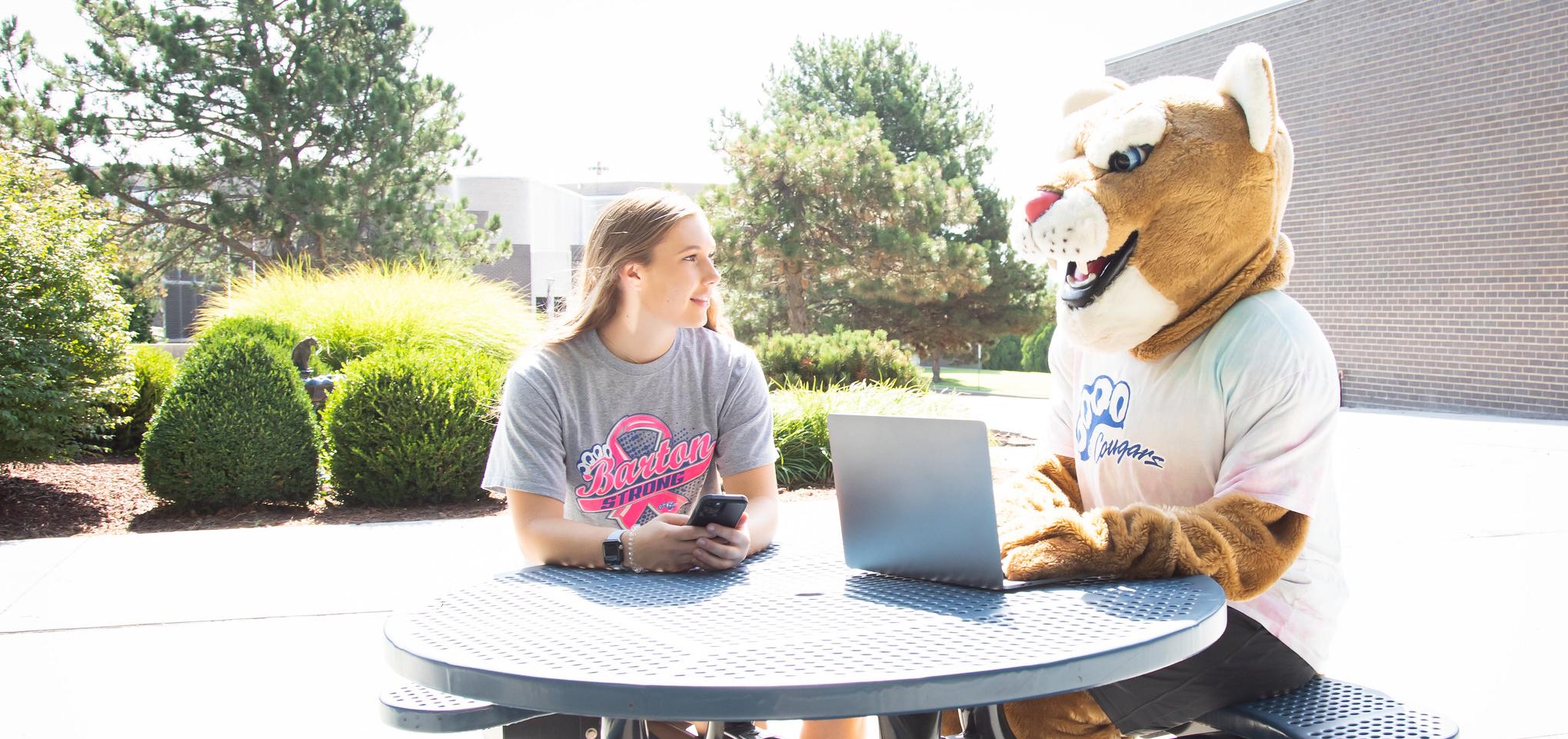 Bart hangs out with student outside the union