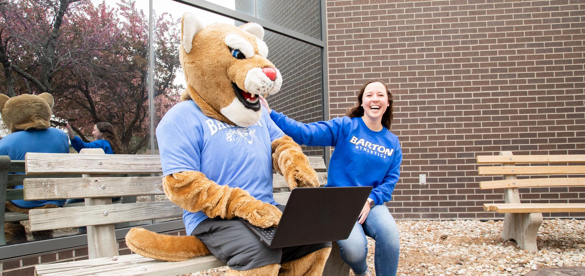 Bart hangs out with a student on campus