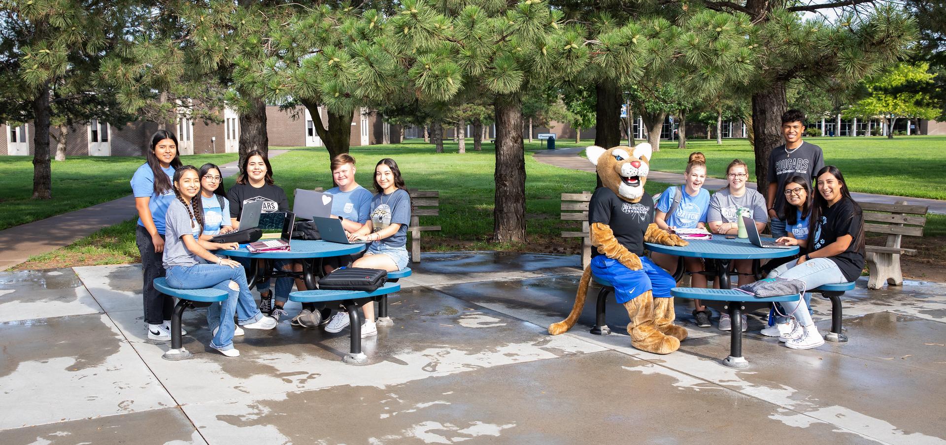 Bart smiles with Barton students