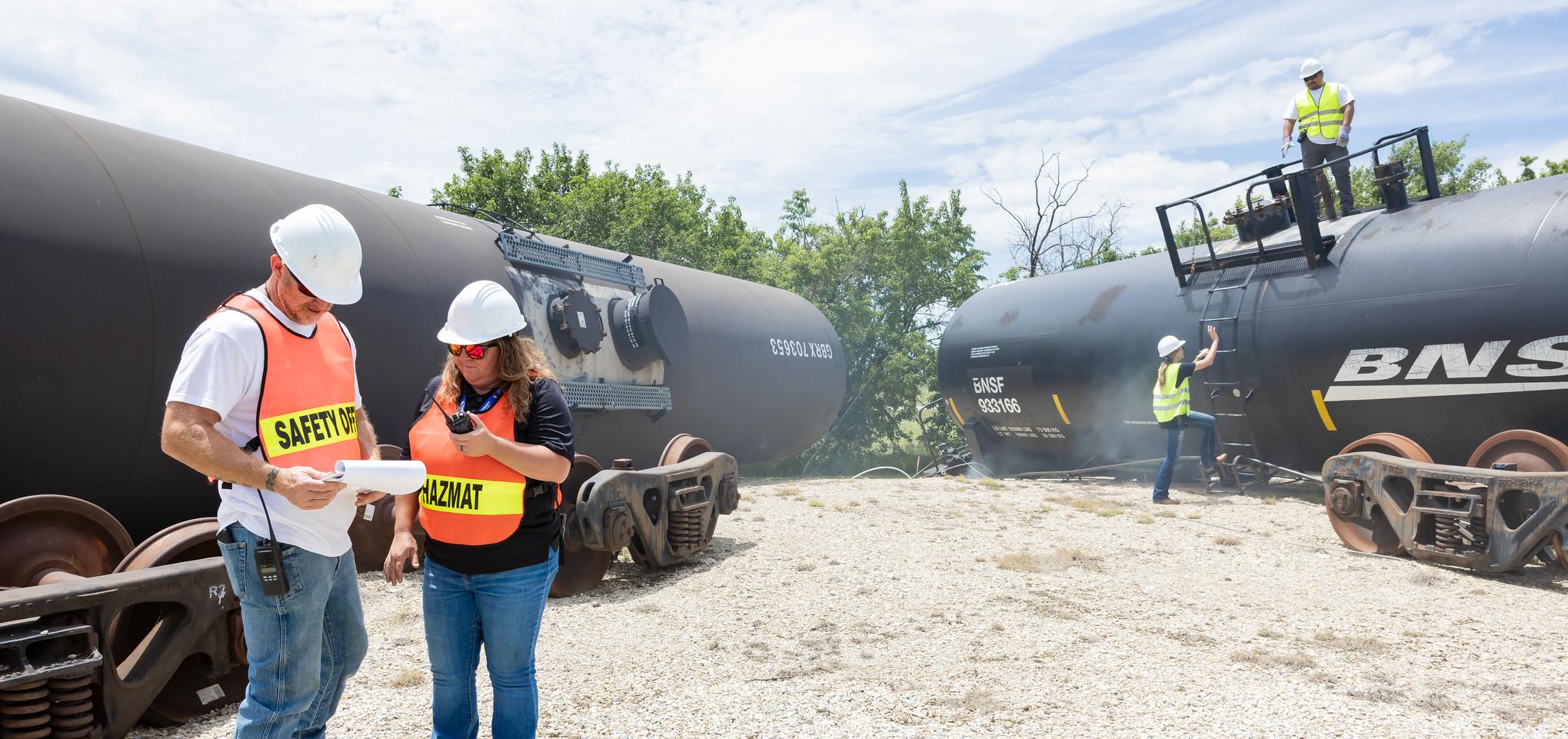 HazMat and safety personnel assess an emergency incident