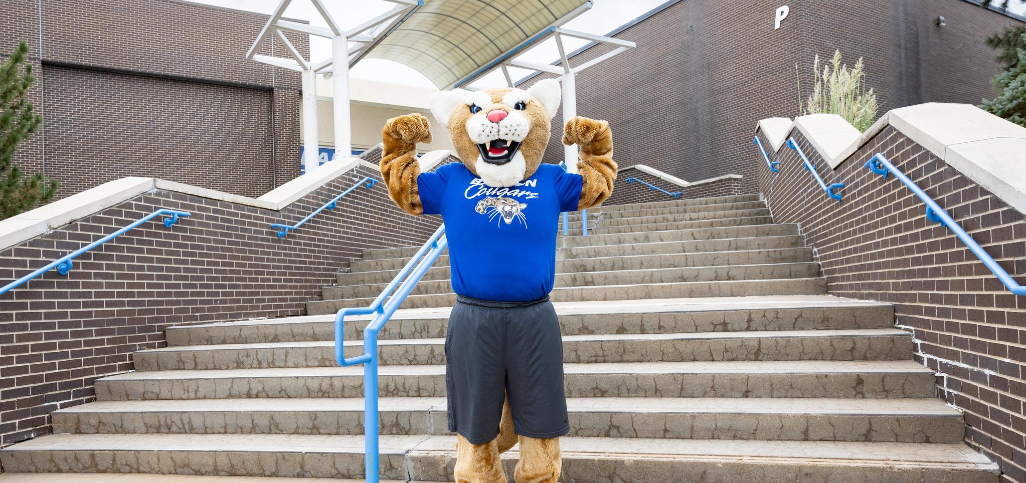 Bart stands at the Kirkman stairs